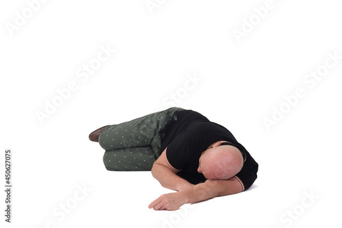 man sleeping on a floor on white background photo