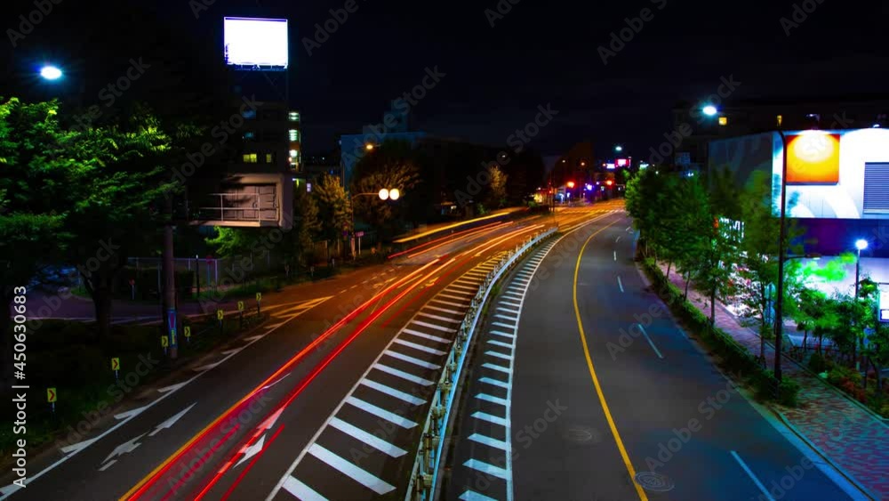 A night timelapse of traffic jam at the downtown street in Tokyo wide shot A night timelapse of traffic jam at the downtown street in Tokyo wide shot