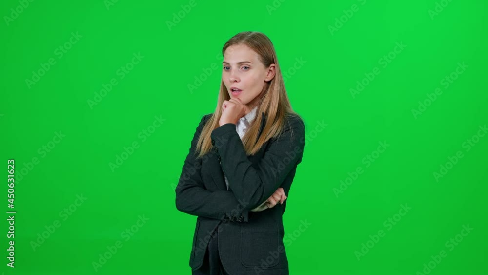 Art director generates ideas, caucasian businesswoman comes up with ideas for a new startup, an emotional blonde woman standing on a green background, a chroma key template. Art director generates ideas, caucasian businesswoman comes up with ideas for a new startup, an emotional blonde woman standing on a green background, a chroma key template.