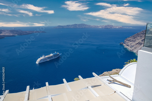 Destination sightseen with cruise ships on Santorini island, Aegean sea bay, Cyclades, Greece. Summer travel vacation, people on cruise ships