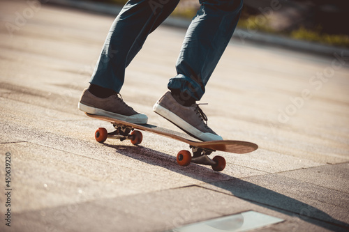 Skateboarder riding on skateboard outdoors in city
