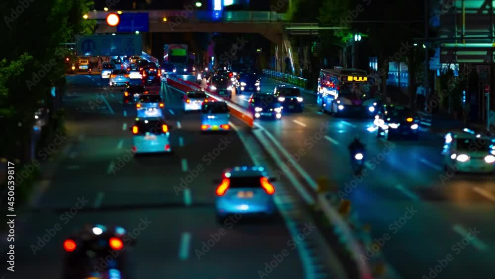 A night timelapse of miniature traffic jam at the downtown street tiltshift tilting A night timelapse of miniature traffic jam at the downtown street tiltshift tilting