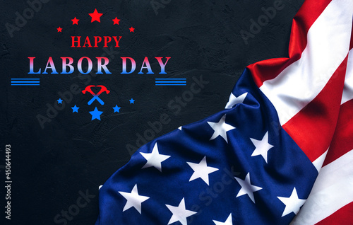 United States national flag on black background with text Happy Labor Day. USA Labor Day concept. 