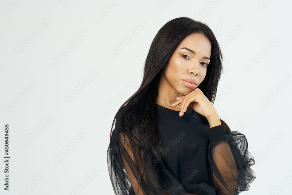 woman african appearance and long dark hair posing studio woman african appearance and long dark hair posing studio