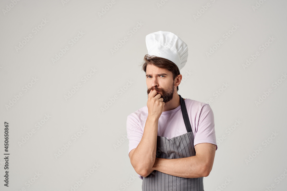 bearded man in chef's uniform gesturing with his hands cooking professional bearded man in chef's uniform gesturing with his hands cooking professional