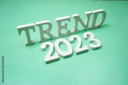 Trend 2023 alphabet letter on green background