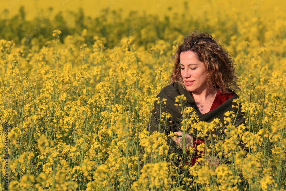 woman with yellow flowers field landscape background woman with yellow flowers field landscape background