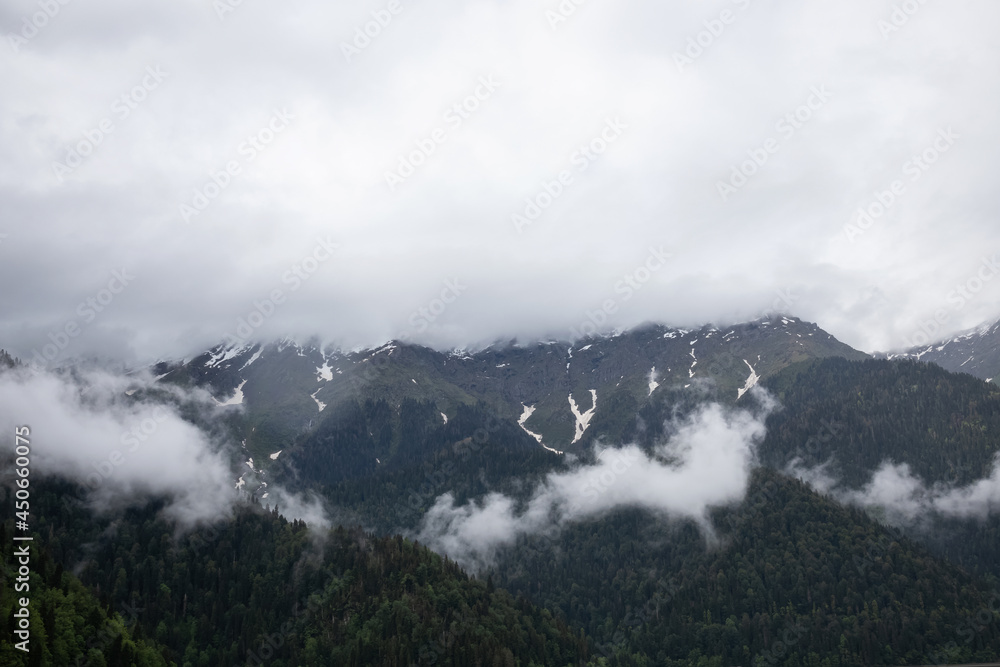 alpine mountains and clouds landscape background