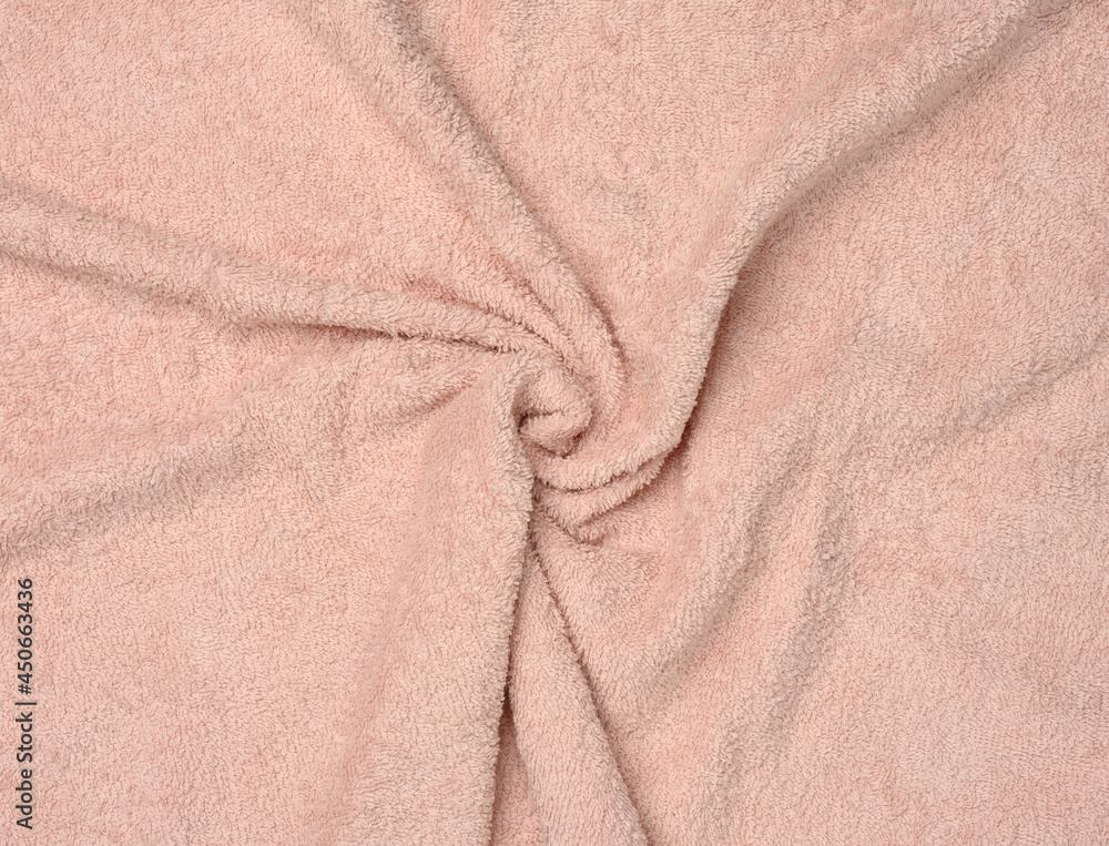 Fototapeta premium Pink twisted terry towel, hygiene item