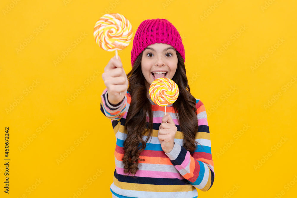yummy. selective focus. happy teen girl licking lollipop. lollipop lady. kid with colorful lollypop yummy. selective focus. happy teen girl licking lollipop. lollipop lady. kid with colorful lollypop