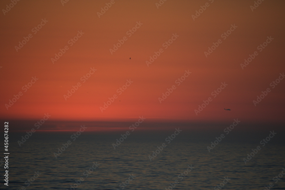 sunset over the sea sunset over the sea