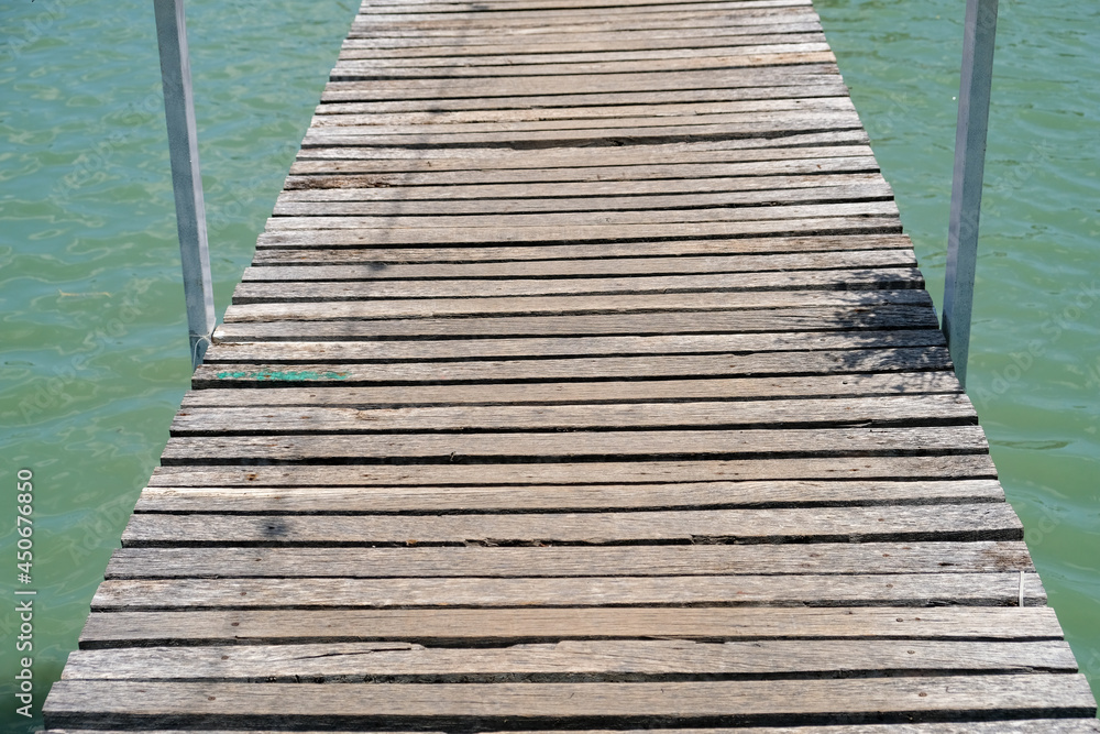 Fototapeta premium old wood bridge floor with water background 