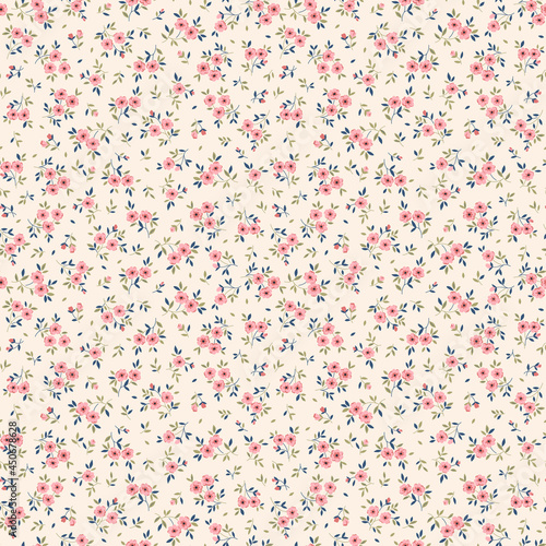 Vintage floral background. Floral pattern with small pink flowers on a ecru background. Seamless pattern for design and fashion prints. Ditsy style. Stock vector illustration.