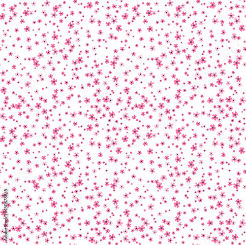 Beautiful floral pattern in small abstract flowers. Small pink fuchsia flowers. White background. Ditsy print. Floral seamless background. The elegant the template for fashion prints. Stock pattern.