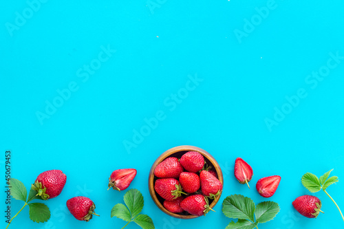 Strawberry flat lay - berries in bowl top view