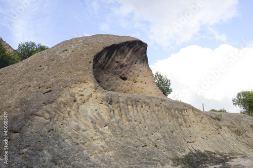 Hollowed out boulder, tafoni, tafone limestone rock formation at Natural park of Ardales