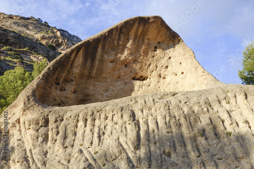 Hollowed out boulder, tafoni, tafone limestone rock formation at Natural park of Ardales