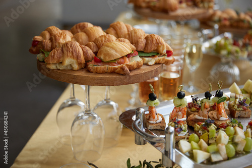 festive table with sandwiches, wine and hemp