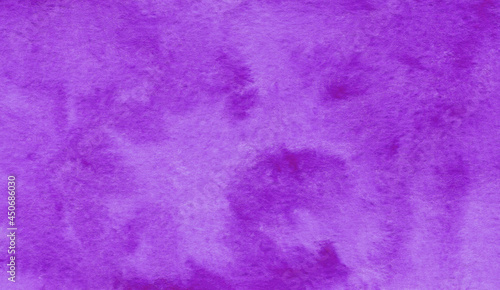 Purple abstract watercolor background on textured paper. Hand made watercolor backdrop