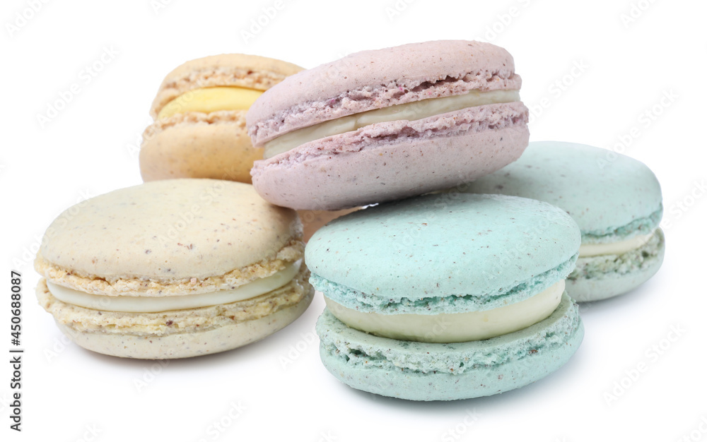 Different delicious colorful macarons on white background Different delicious colorful macarons on white background
