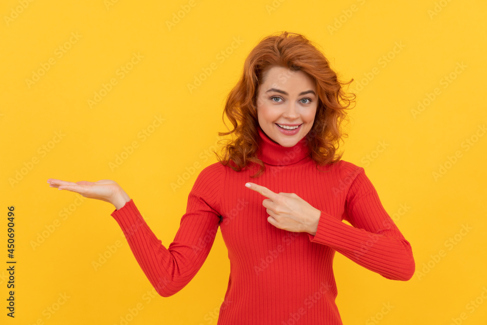 point finger on product. place for promotion and creativity. woman with copy space for advertisement point finger on product. place for promotion and creativity. woman with copy space for advertisement