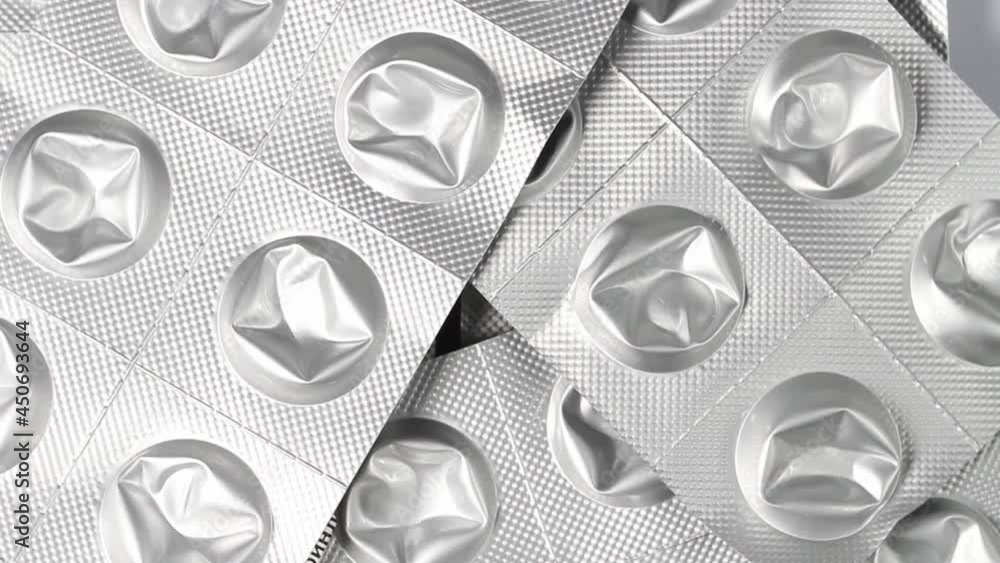 Empty pill or pill packaging falling on the turntable, medical drugs cost concept Empty pill or pill packaging falling on the turntable, medical drugs cost concept