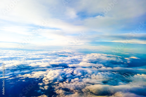 Magical view from the height of a flying plane, beautiful sky, background.