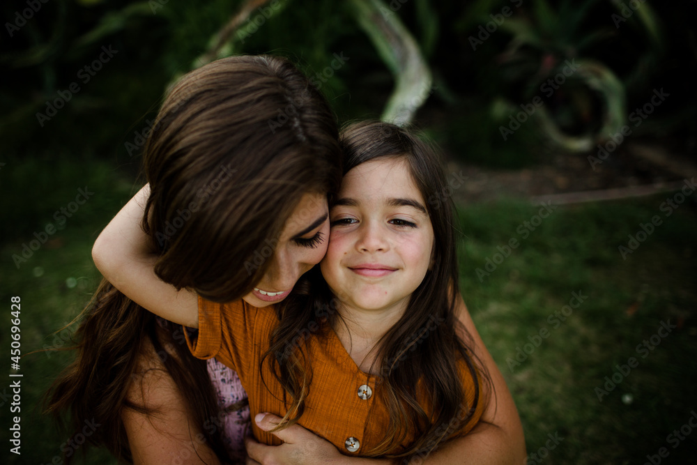 Mother & Daughter Embracing in San Diego Mother & Daughter Embracing in San Diego