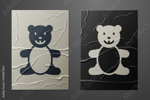 White Teddy bear plush toy icon isolated on crumpled paper background. Paper art style. Vector