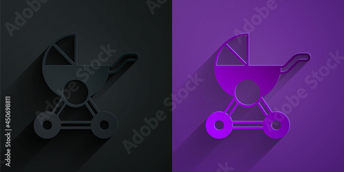 Paper cut Baby stroller icon isolated on black on purple background. Baby carriage, buggy, pram, stroller, wheel. Paper art style. Vector