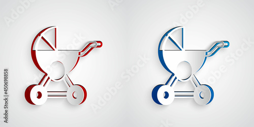 Paper cut Baby stroller icon isolated on grey background. Baby carriage, buggy, pram, stroller, wheel. Paper art style. Vector