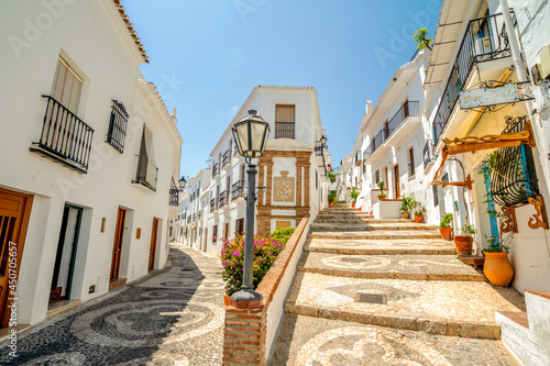 Picturesque town of Frigiliana located in mountainous region of Malaga, Andalusia, Spain photo