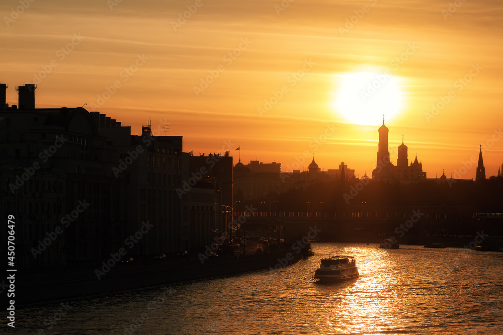 Evening view on sunset over Moscow cityscape and the Moskva river