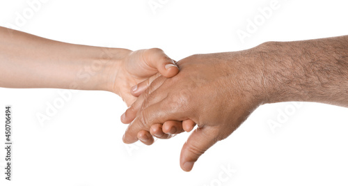 Woman holding hand of mature man on white background, closeup. Support concept