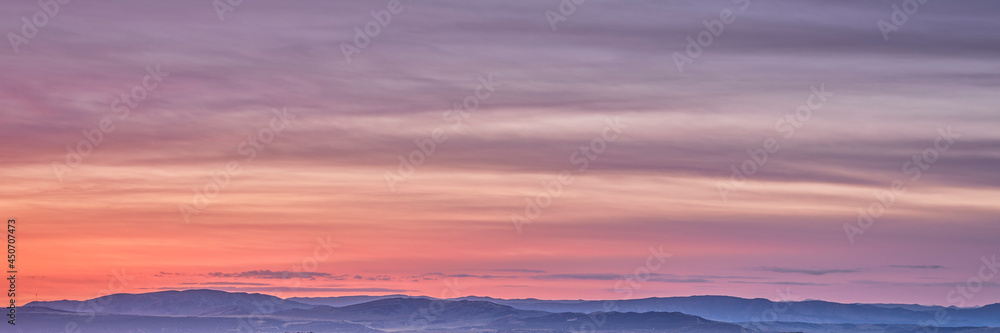 colorful sky over Yampa River valley at dawn near Dinosaur National Monument in north western Colorado, panoramic web banner
