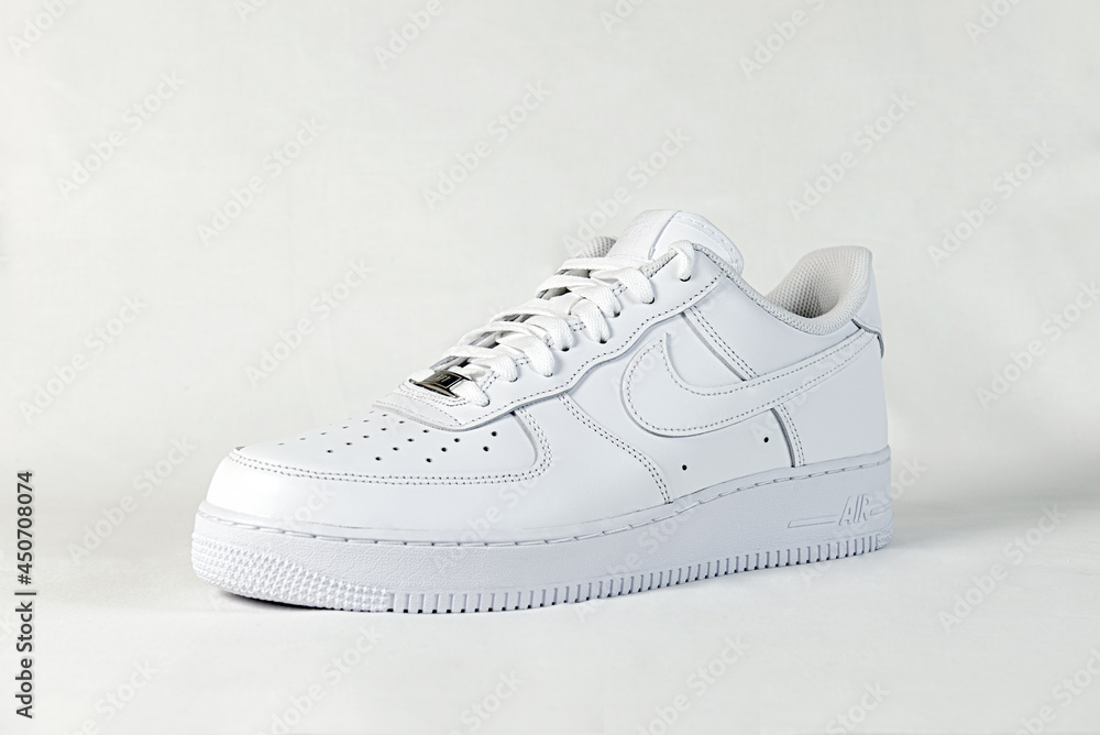 white Nike Air Force One shoes on white background Stock Photo | Adobe Stock