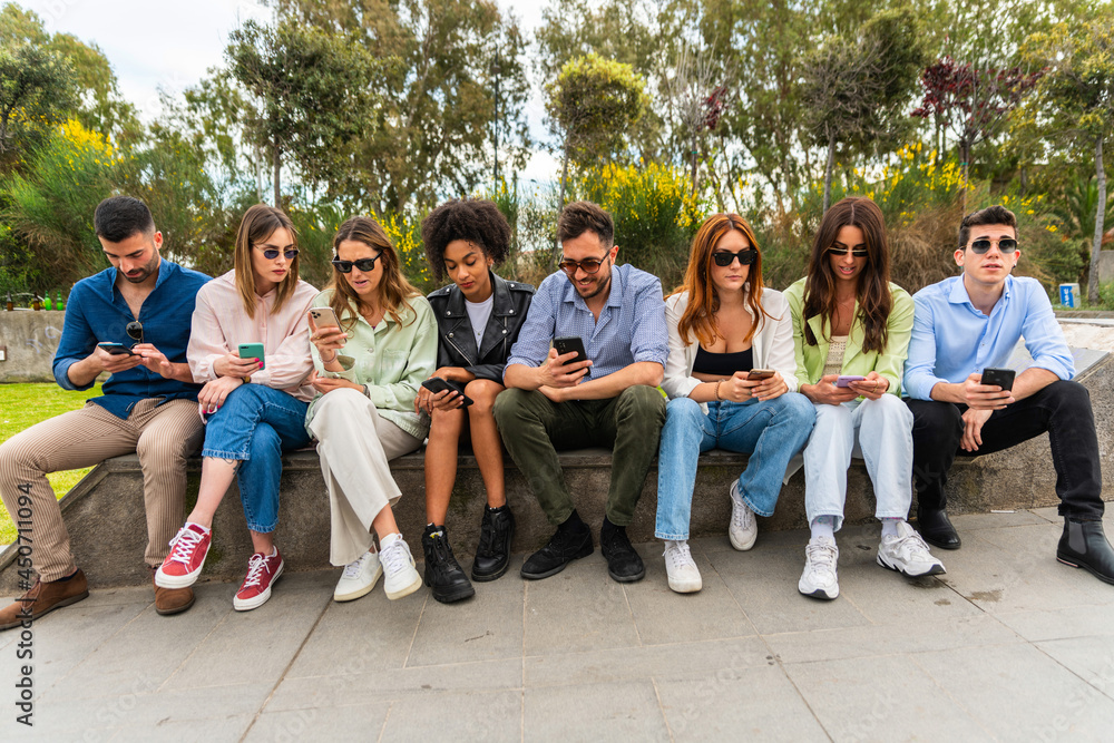 Young people using smartphone in hand – group friend with smart phone – social person in chat with mobile cell – digital touch and technology concept – cellphone for message Young people using smartphone in hand – group friend with smart phone – social person in chat with mobile cell – digital touch and technology concept – cellphone for message