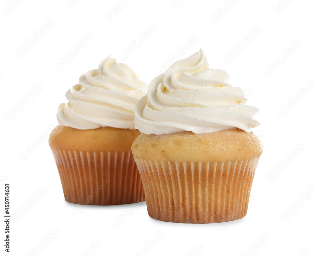 Delicious cupcakes decorated with cream on white background Delicious cupcakes decorated with cream on white background