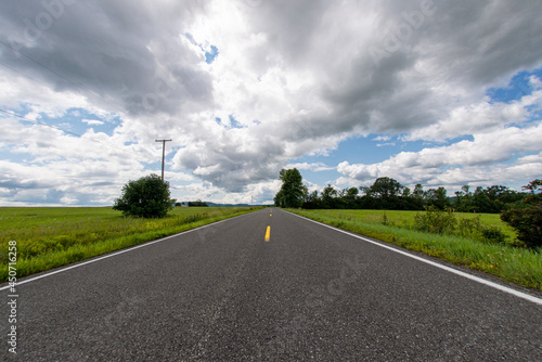 View of a road in perspective in summer in Essex County New York photo