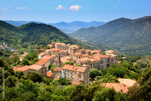 The village of Sainte-Lucie-de-Tallano in the south of corsica island, France. The village lies in the middle of orchards, olive trees an vineyards. photo