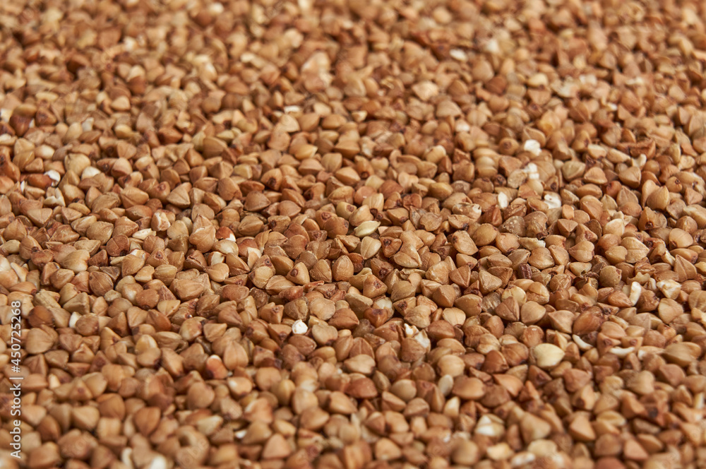 Uncooked buckwheat grain top view Uncooked buckwheat grain top view