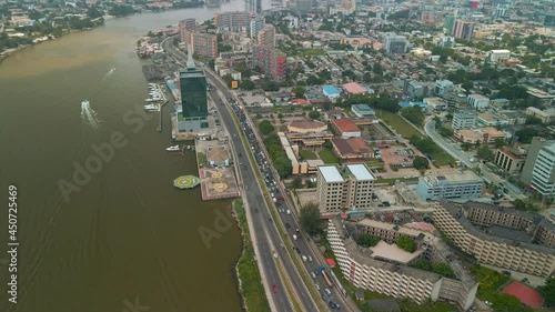 Traffic and cityscape of Falomo Bridge, Lagos Law school and the Civic centre tower in Lagos Nigeria photo