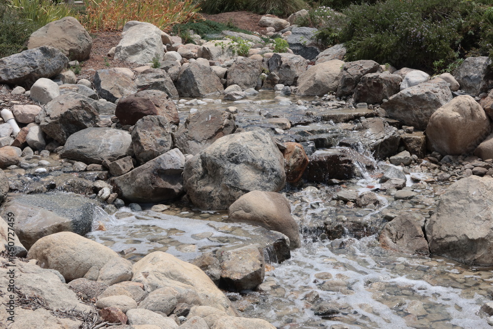 Water Flowing over Rocks in a Small Stream Water Flowing over Rocks in a Small Stream