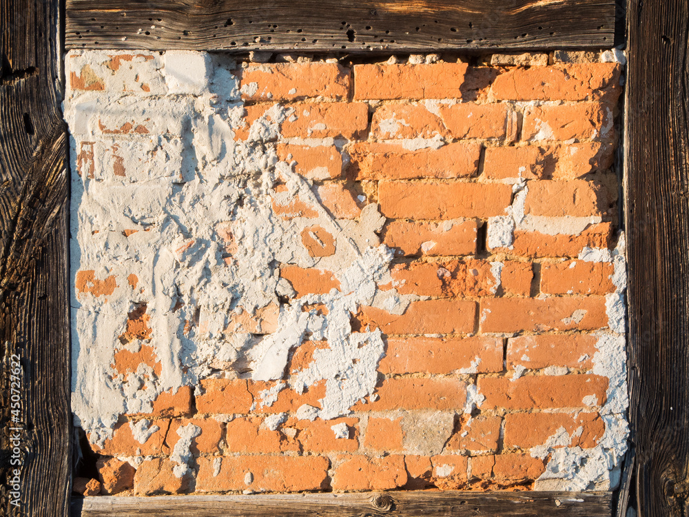 Naklejka premium Open half-timbered wall with cement