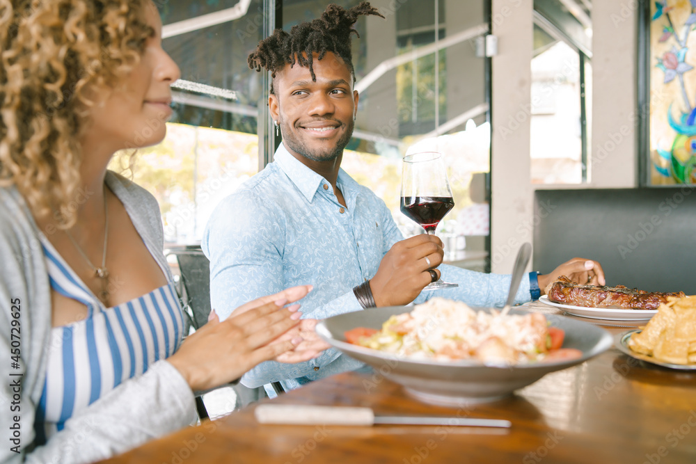 Couple having a lunch date at a restaurant. Couple having a lunch date at a restaurant.