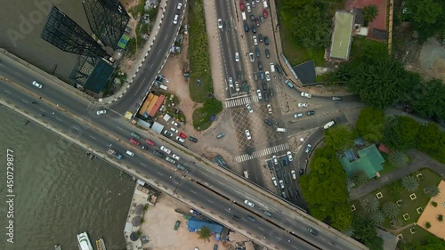 Traffic and cityscape of Victoria Island, Lagos, Nigeria featuring Falomo Bridge, Lagos Law school and the Civic centre tower photo