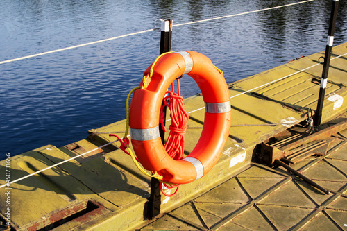 Lifebuoy on the berth fence close up