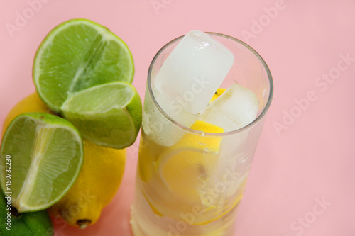 glass of lemonade.cocktail with lime. lemonade with lime and mint. slices and lemon in the cut