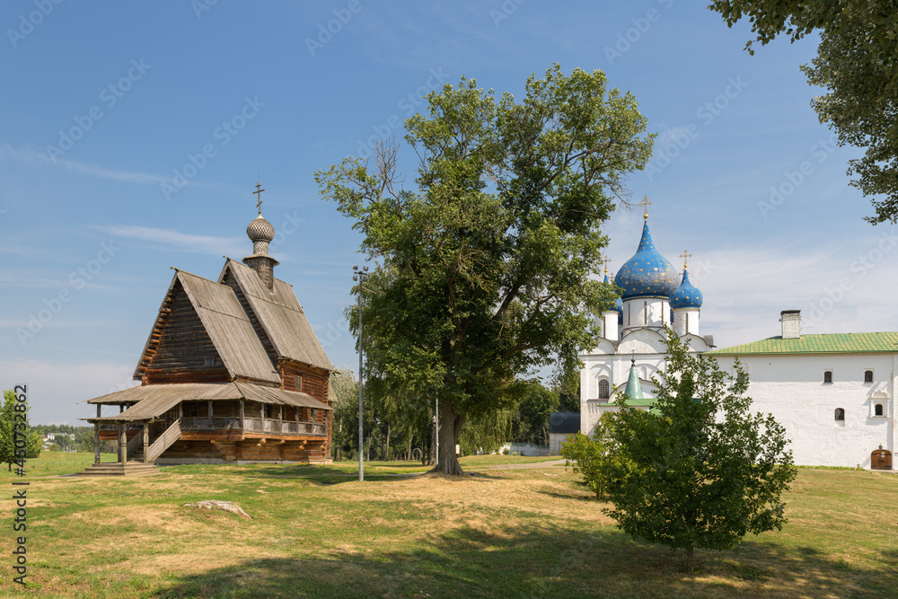 St Nicholas wooden church and Virgin Nativity Cathedral in Suzdal kremlin. Suzdal, Russia