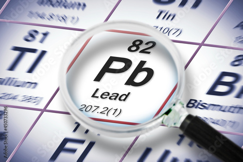 Fotografi Lead chemical element with the Mendeleev periodic table - Concept image seen thr
